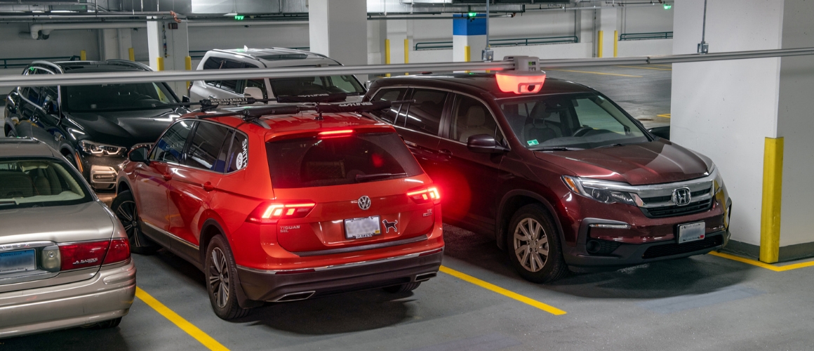 M5 garage parking sensor turns red after car parks in Aspen parking garage.