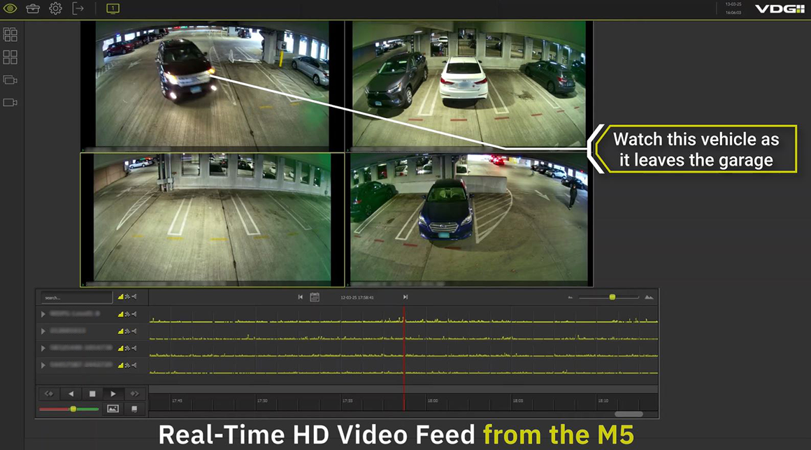 HD security footage from the M5 system capturing vehicle and person movement in a parking garage.
