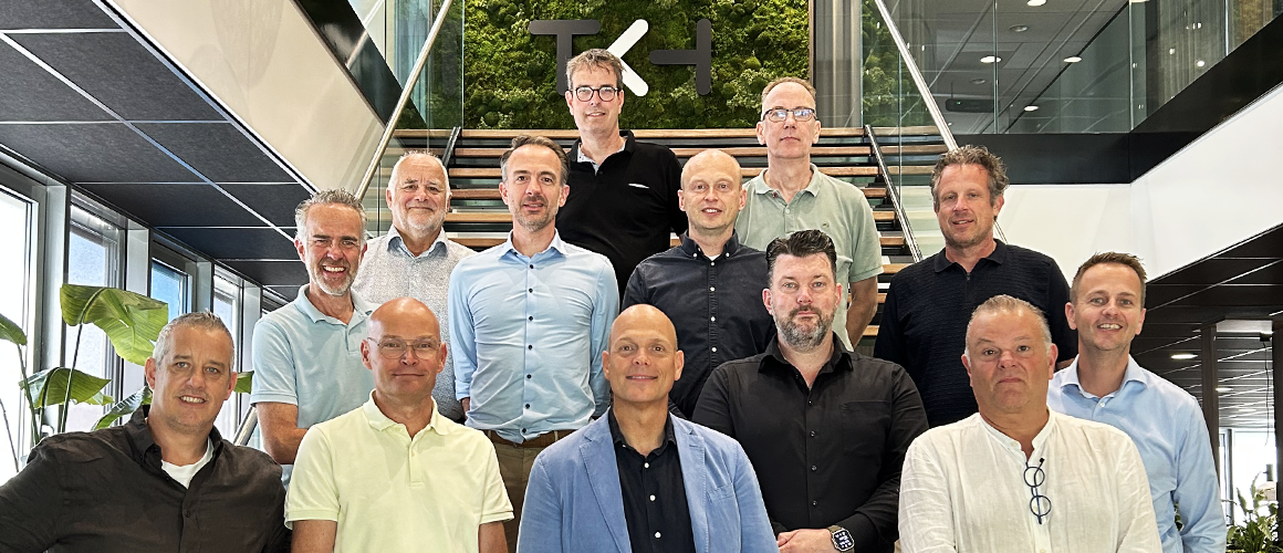 TKH Security and BAM Bouw en Techniek teams in a collaborative meeting on accelerating sustainability in the security and construction industries.