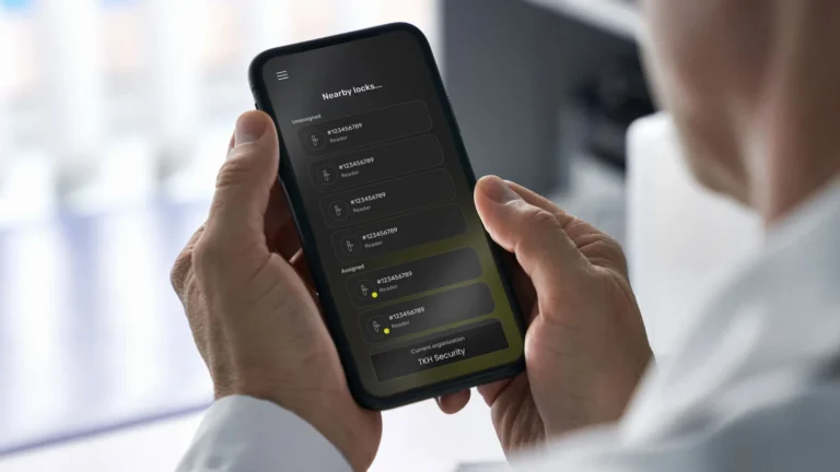 Installer using a smartphone to configure access control settings in the ATLAS Config app