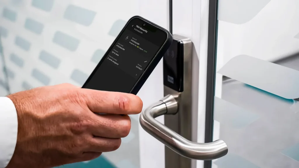 Facility manager using a mobile to add a lock to the ATLAS access control system