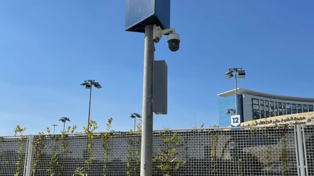 Surveillance camera mounted on a pole at Tamdeen Group property